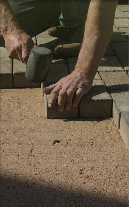 img-man-laying-blocks