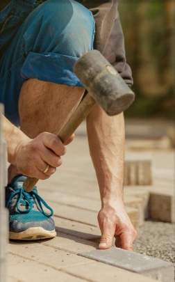 img-man-with-hammer